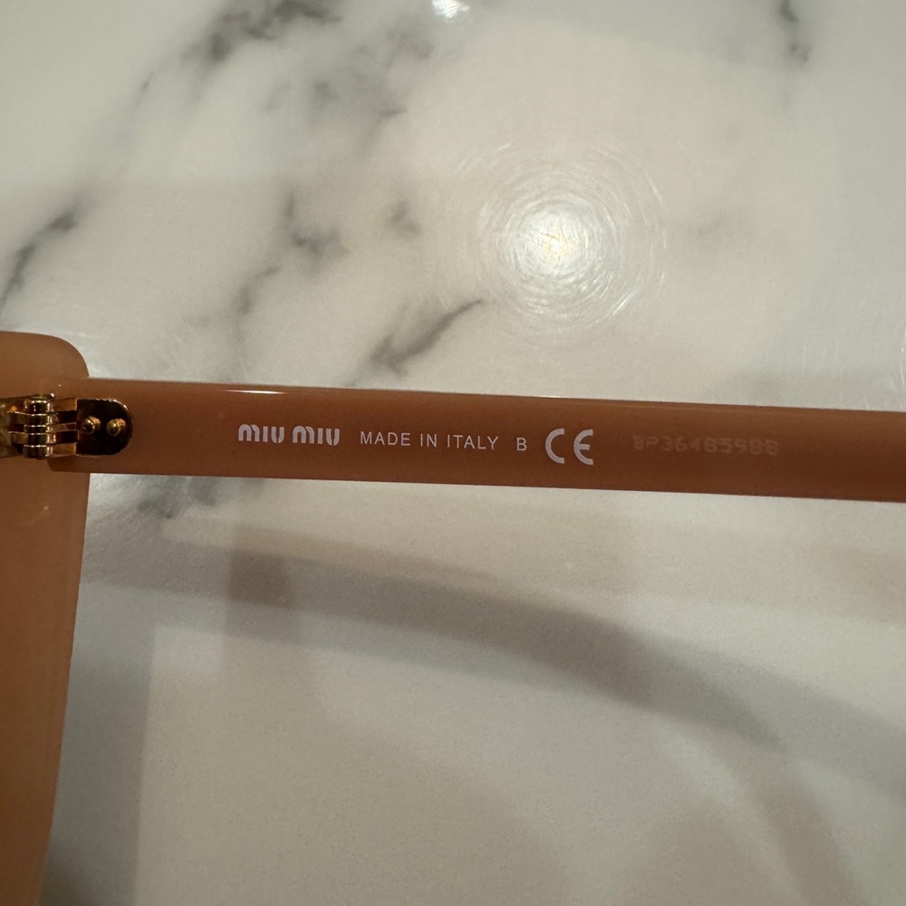 Miu Miu Blush Sunglasses made in Italy 
Model number SMU 02W - Picture 8 of 8